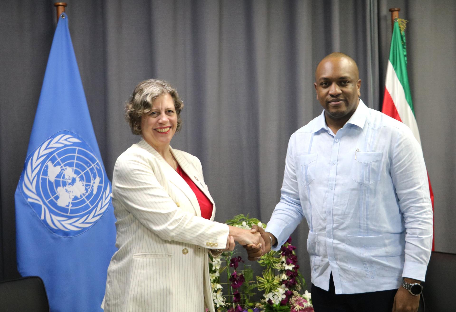 Katy Thompson RR Guyana and Suriname with the Minister of Foreign Affairs Suriname