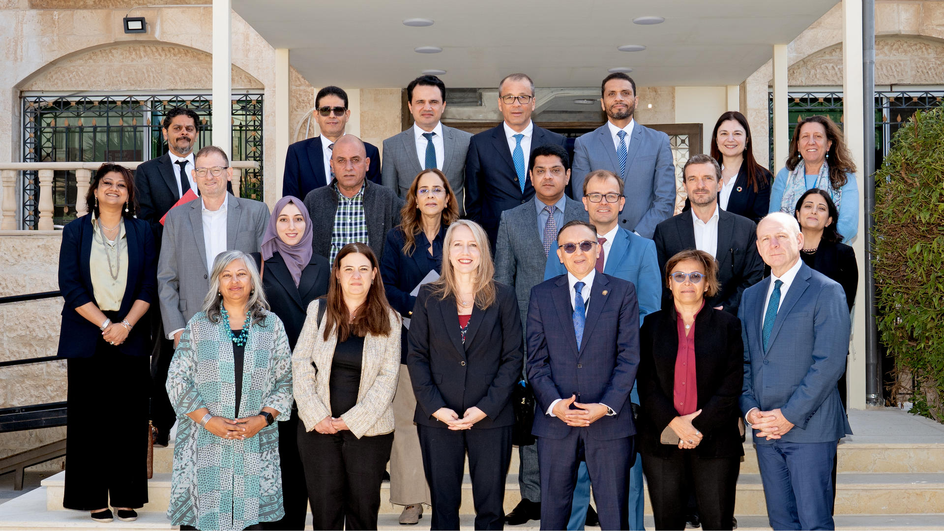 A delegation of ambassadors from the Executive Board participate in a group photo session to mark the conclusion of their field visit to Jordan. 