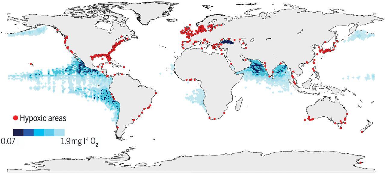 World map showing red tropical regions and blue areas; light gray continents; legend bottom-left.