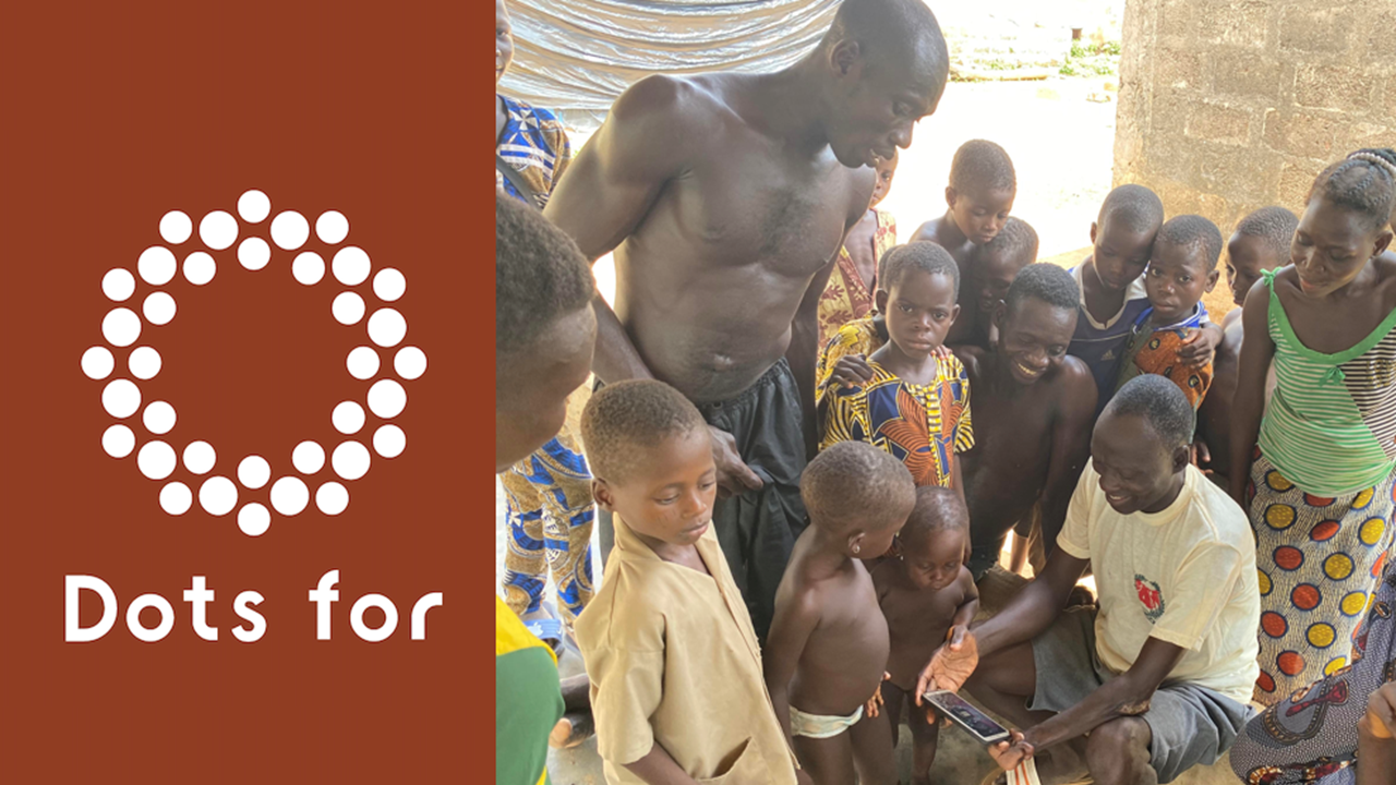 Orange panel with dotted circular logo Dots for; right: shirtless man with children in a village.