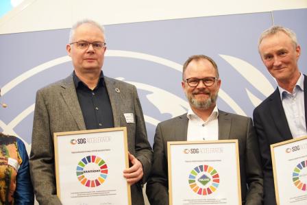 Men receiving an award