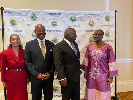 UNDP Resident Representative poes with the Prime Minister of The Bahamas, the Minister of Social Services and the Chair of the National Commission for Persons with Disabilities