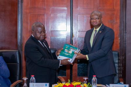 UNDP-CMR-Mr. Aliou Mamadou Dia, UNDP RR, handing over Strategic Studies on Decentralisation and Local Development to the Minister, Mr. Elanga Obam Géorges-2023