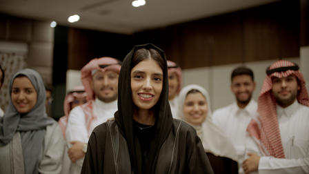 Nora poses with other young leaders during a training session