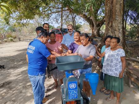 Village chief of Washabo,  Captain  Sri  Sria,  presented the rice mill  to   the   women, witnessed   by   the Resident Representative,  Mr.  Gerardo Noto, and   Deputy  Resident  Representative  of  UNDP,  Mr. Berdi Berdiyev. 