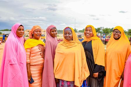 a group of people posing for the camera