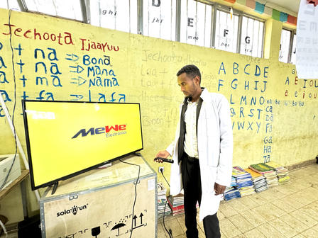 a man standing in front of a store
