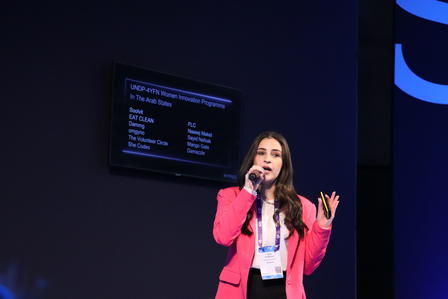 a person standing in front of a stage
