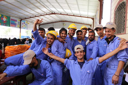 a group of people posing for the camera