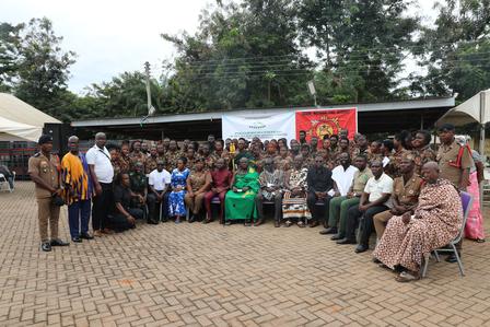 a group of people standing in front of a crowd