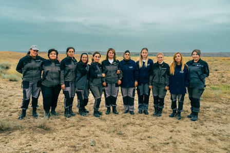 a group of people posing for a photo