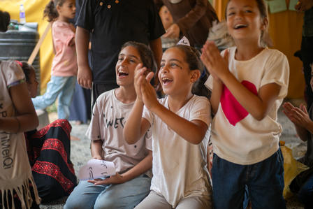 a group of people posing for the camera