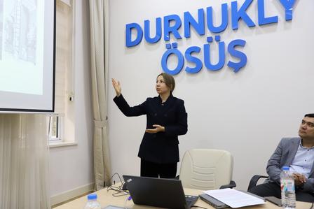 a woman standing in a room