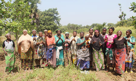 a group of women in a farm