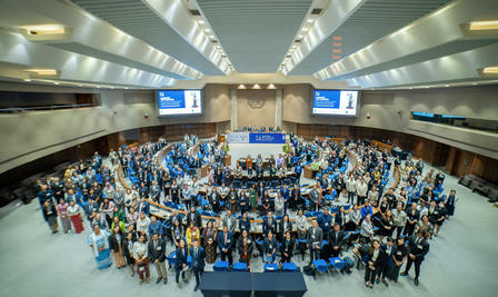 a large crowd of people in a room