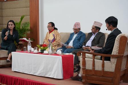 a group of people sitting at a table