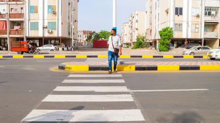a person riding a skateboard on a city street