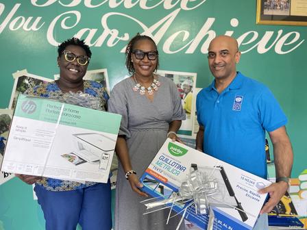 UNDP Resident Representative hands over supplies to Genesis Academy