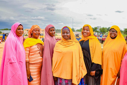 a group of people posing for the camera