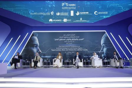 Panel discussion with five speakers on stage, modern backdrop, and futuristic lighting.