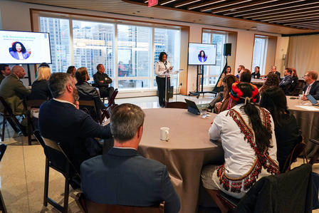 A speaker presents to an audience seated around a circular table in a modern conference room.H.E. Madalistso Kambauwa Wirima, Minister of Education, Science, Technology and Innovation, Republic of Malawi, speaking at the Nature ID roundtable hosted by The Rockefeller Foundation in New York during UNGA24