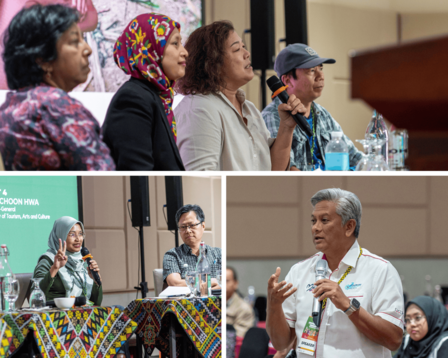 A panel discussion with four speakers, diverse in attire, engaged in conversation.