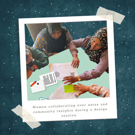 Group of women collaborating around a table with notes and papers during a design session.