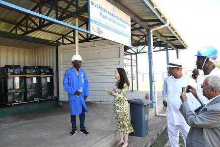 Ambassador Joanne Minns, Dr. Mohamed Abchir, and other officials visited a medical incinerator at Riverside Warehouse in Gumbo.