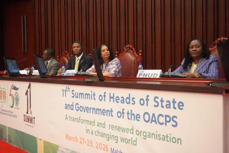 Photograph of officials at the OACPS Heads of State Summit panel.