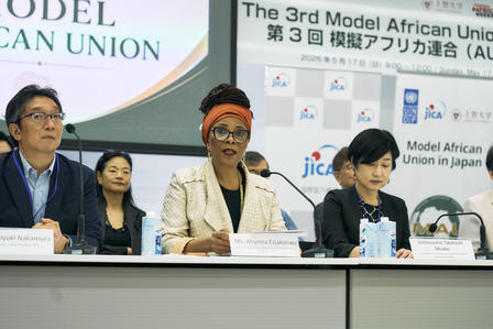 Five panelists seated at a conference table, with a banner reading The 3rd Model African Union.