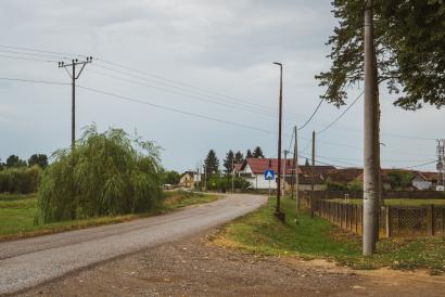 a sign on the side of a road