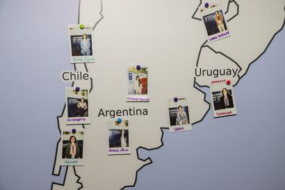 South America map highlighting Argentina with Chile and Uruguay, small photos pinned at locations.