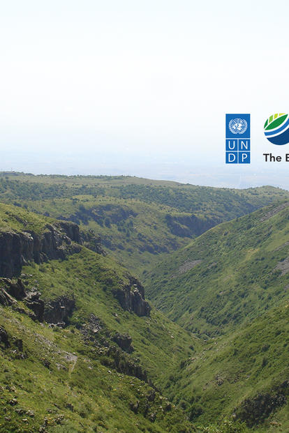 a sign on the side of a mountain