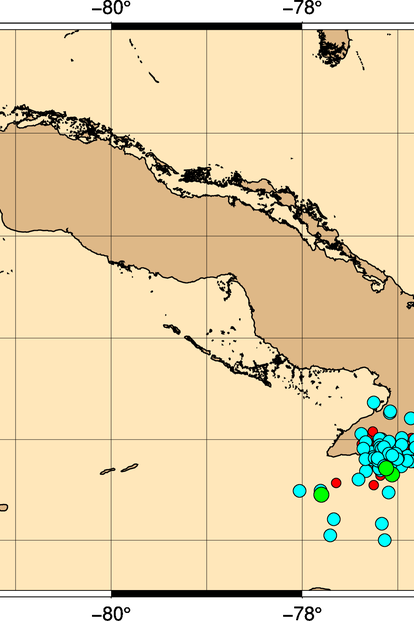 Map of the Caribbean with brown landmasses and blue and orange data points.