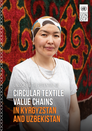Magazine cover: woman in white top and headscarf before a red patterned textile background.