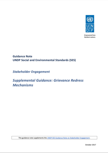 Document cover with blue UN logo top right; title includes Grievance Redress Mechanisms.