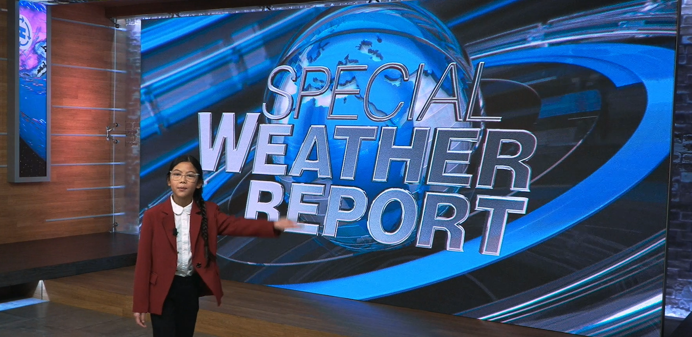 girl forecasting weather on news